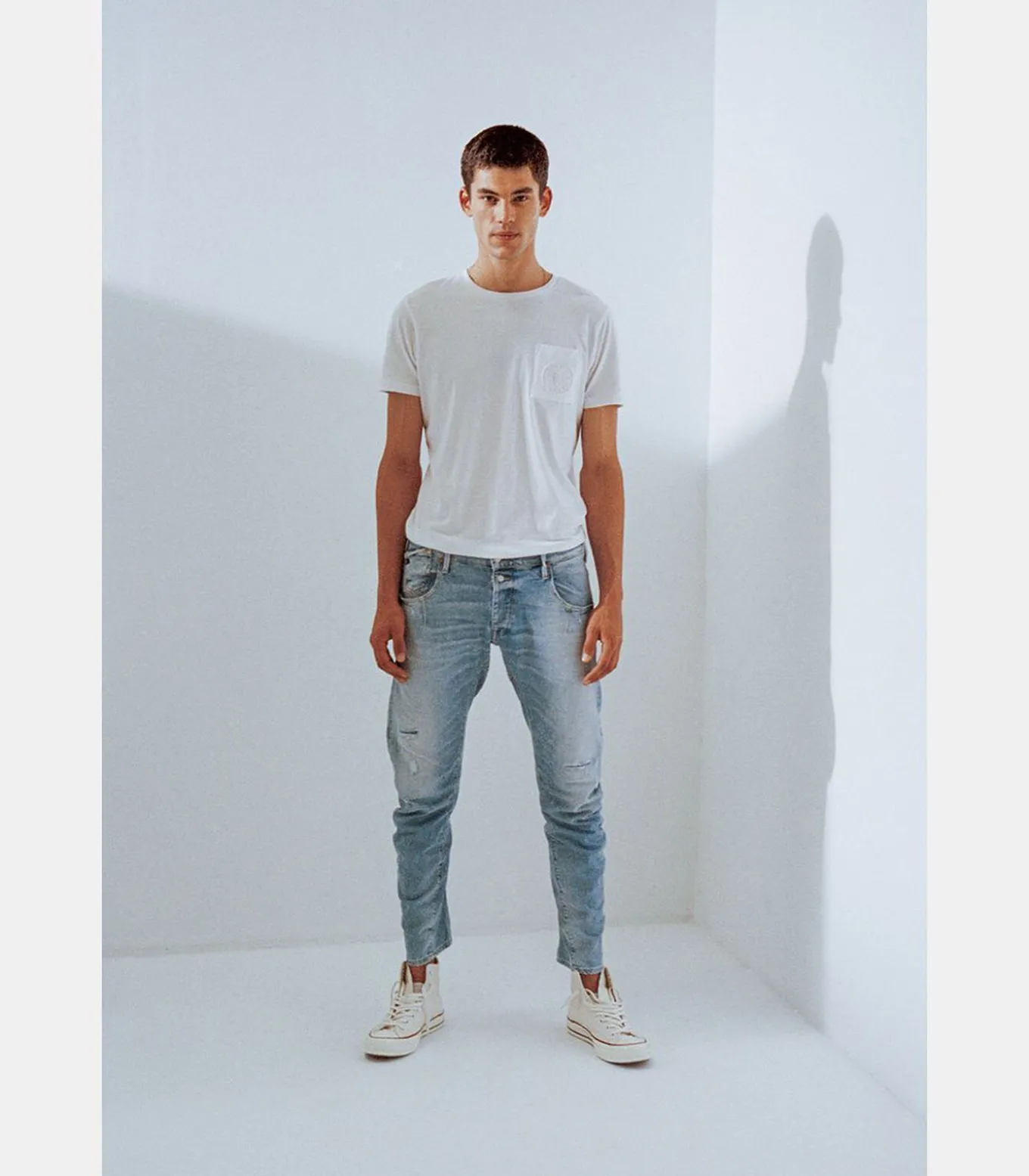 Jeans tapered , lengte 34